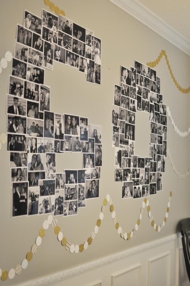 Black and white photographs arranged on a wall to form the number sixty with gold garlands.